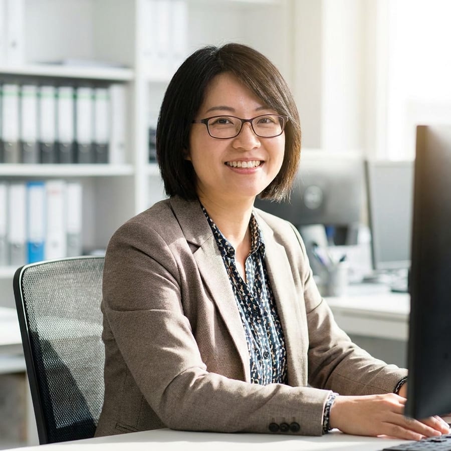 Medtax account manager at her desk